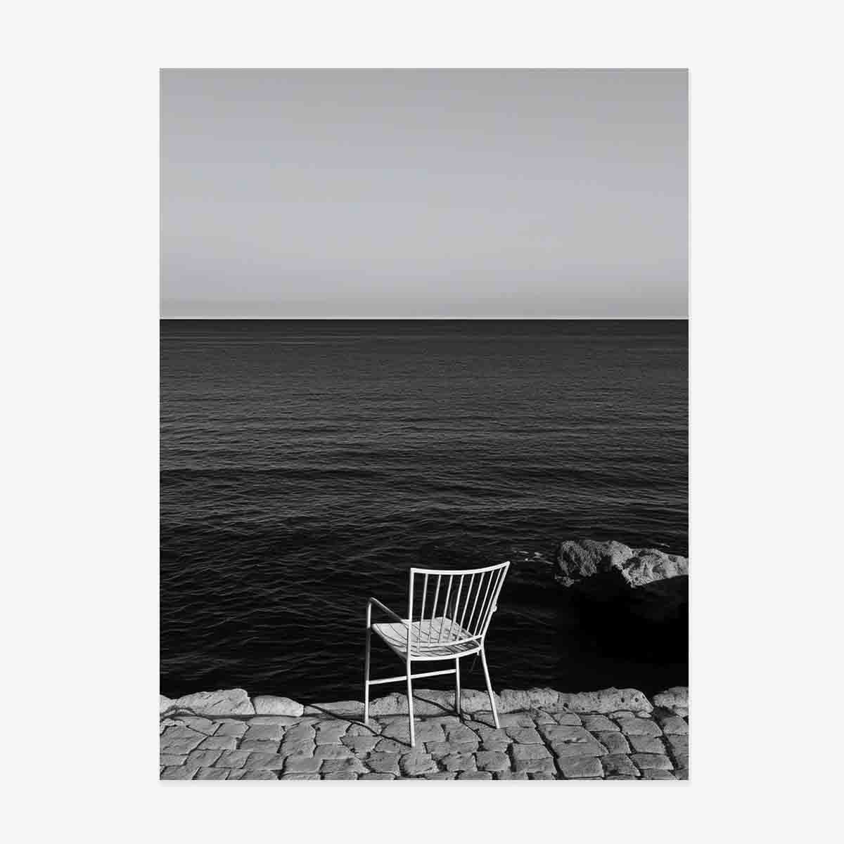Poster Solitary chair by the sea